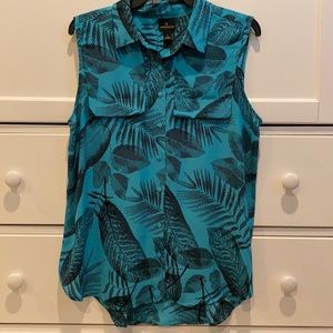 Turquoise sleeveless blouse